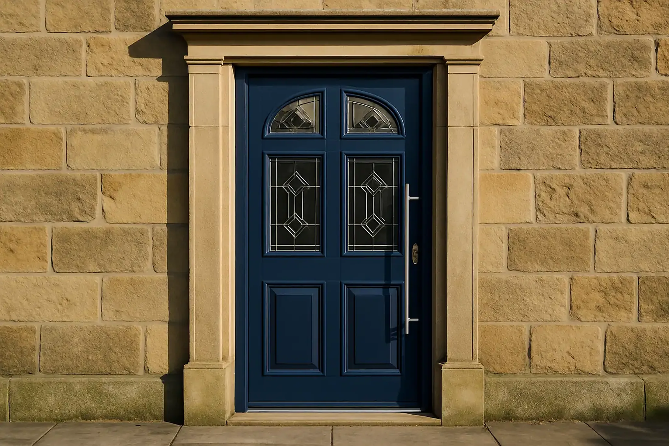 A blue Palladio front door with glazed panels on a Scottish house frontage