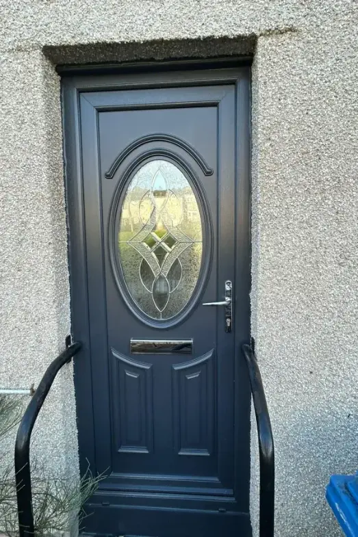 Anthracite grey uPVC front door with oval glass panel, Bearsden