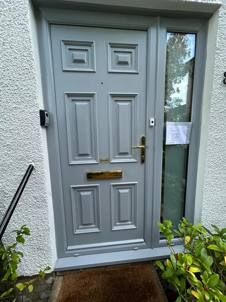 Palladio door silvery grey with gold lever handle by Ultimate Home Solutions