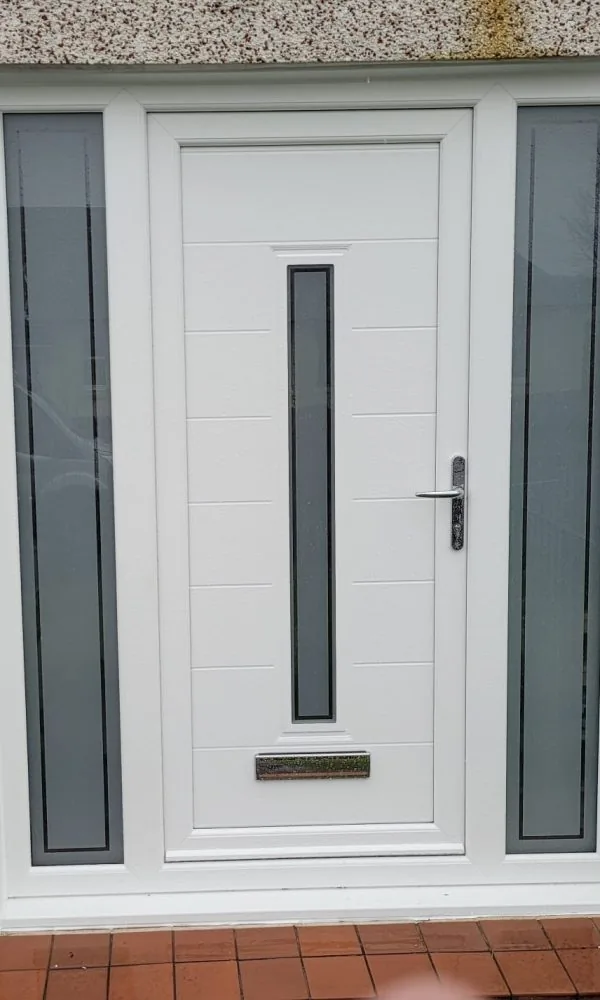 White uPVC roxburgh door and panels, fitted by Ultimate Home Solutions