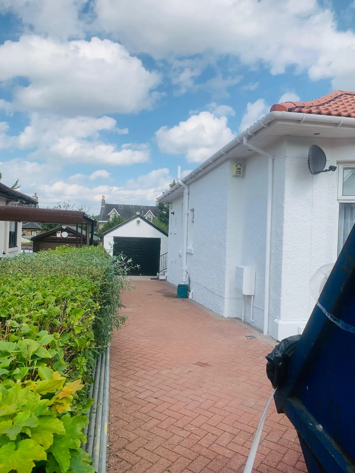New red pantile roof edge and white guttering, completed, in Paisley by Ultimate Home Solutions